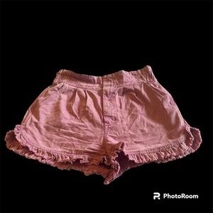 Pink high waisted TGLA ruffle shorts